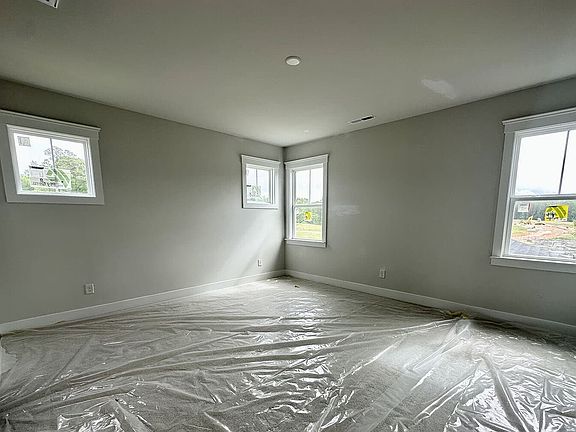 The primary bedroom of the Mason on Homesite 2286 at Wendell Falls by Brookfield Residential