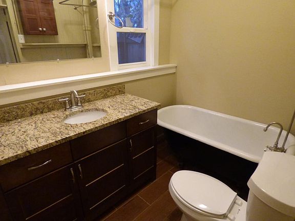 Full bath with clawfoot tub.