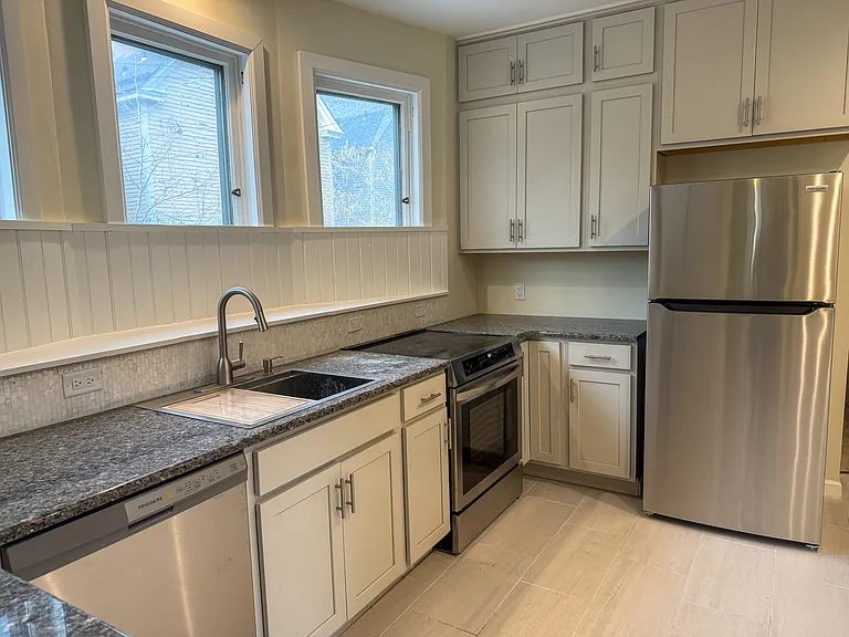 Brand New Kitchen with all new cabinets, counters and stainless steel appliances.