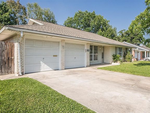 2 Car garage with a nice size driveway for your guest
