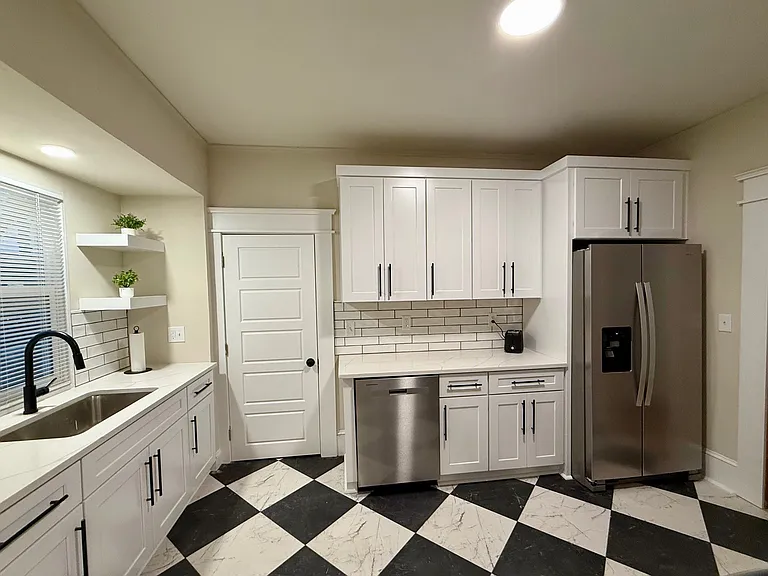 Shaker style cabinets with classic subway tile