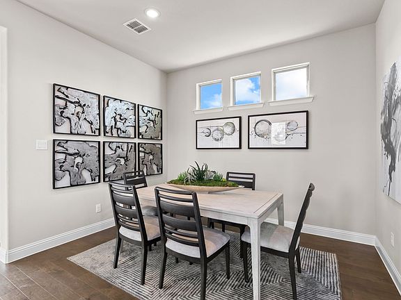 Dining room in the Sauvignon home plan by Trophy Signature Homes