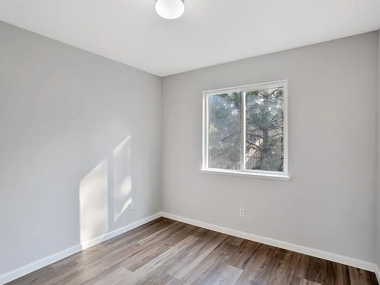 The view of one of the upstairs bedrooms from the doorway.