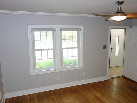 Living room looking towards front of the unit. Front Door is on the right.