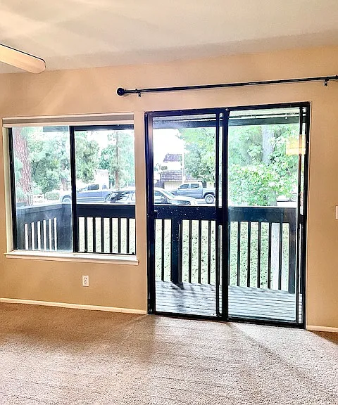 Primary sliding glass doors to balcony