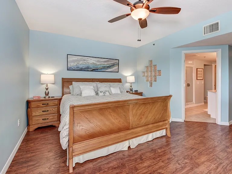 An absolutely stunning master bedroom with plenty of room and a walk in closet. Sliding glass door and private balconyEpic sunsets every night