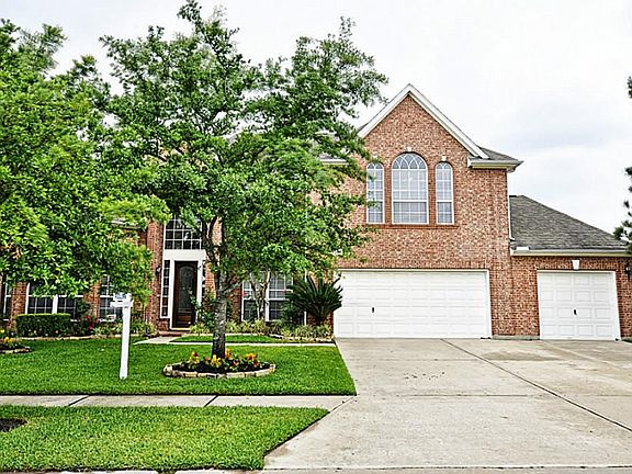 4 bed / 3 1/2 bath / 3 car garage with Saltwater Pool on the Houston National Golf Course. No neighbors in front, far away in back, and only on one side.
