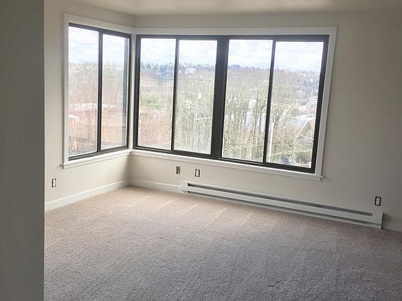 This is what you see when you walk in the door. You can see UW, the mountains, lake Union, and tons of city views. It's amazing at night too!
