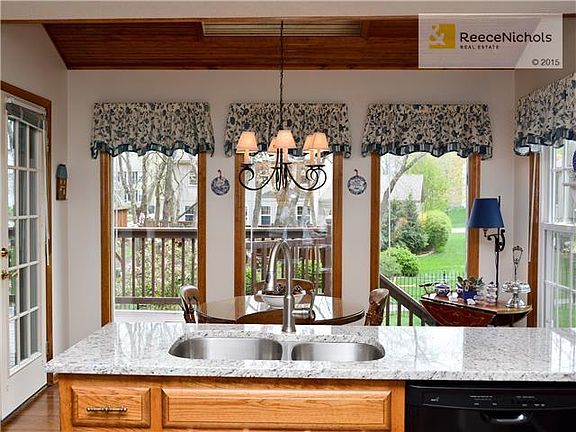 KITCHEN AND BREAKFAST NOOK, BEAUTIFUL VIEW AND DOOR TO DECK