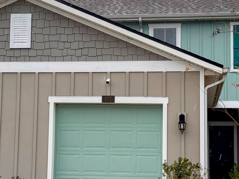 Entryway on right hand side, 1-car garage/driveway, security cameras available