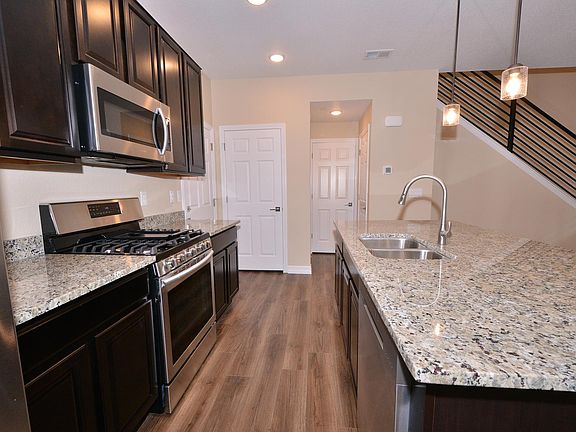 Kitchen with granite counters and stainless appliances