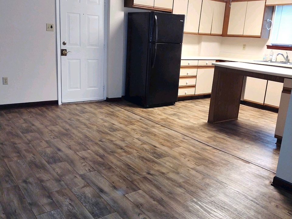 Kitchen with large refrigerator