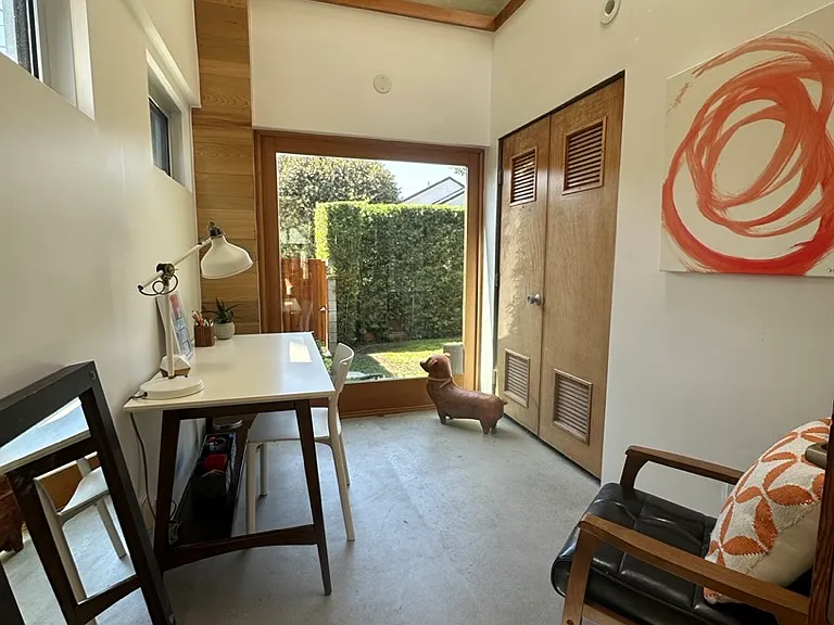 Front office area, lots of light, high ceilings, great place to work and heavy interior glass doors ensure quiet from the rest of the house