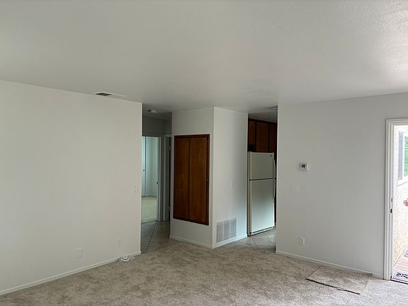 Kitchen on right. Bedrooms on left.