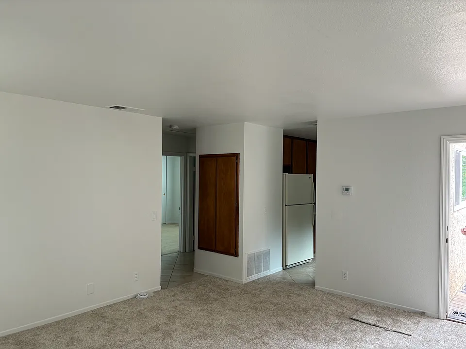 Kitchen on right. Bedrooms on left.
