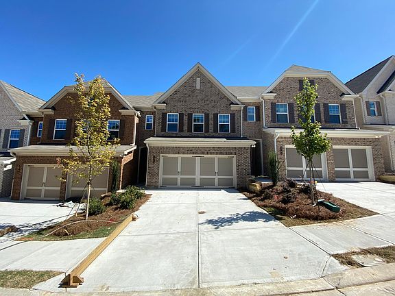 Front view w/ Neighboring Homes.