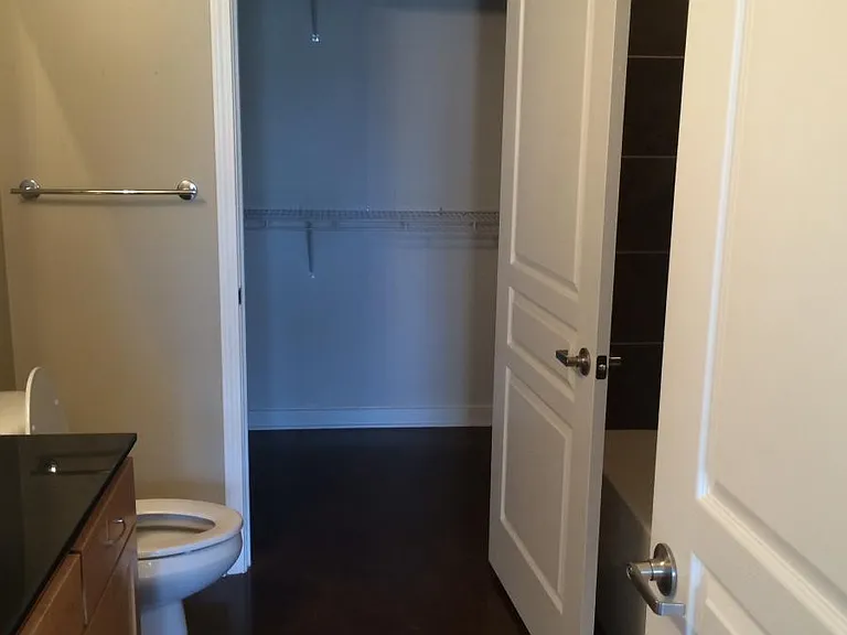 view into closet from Master bathroom