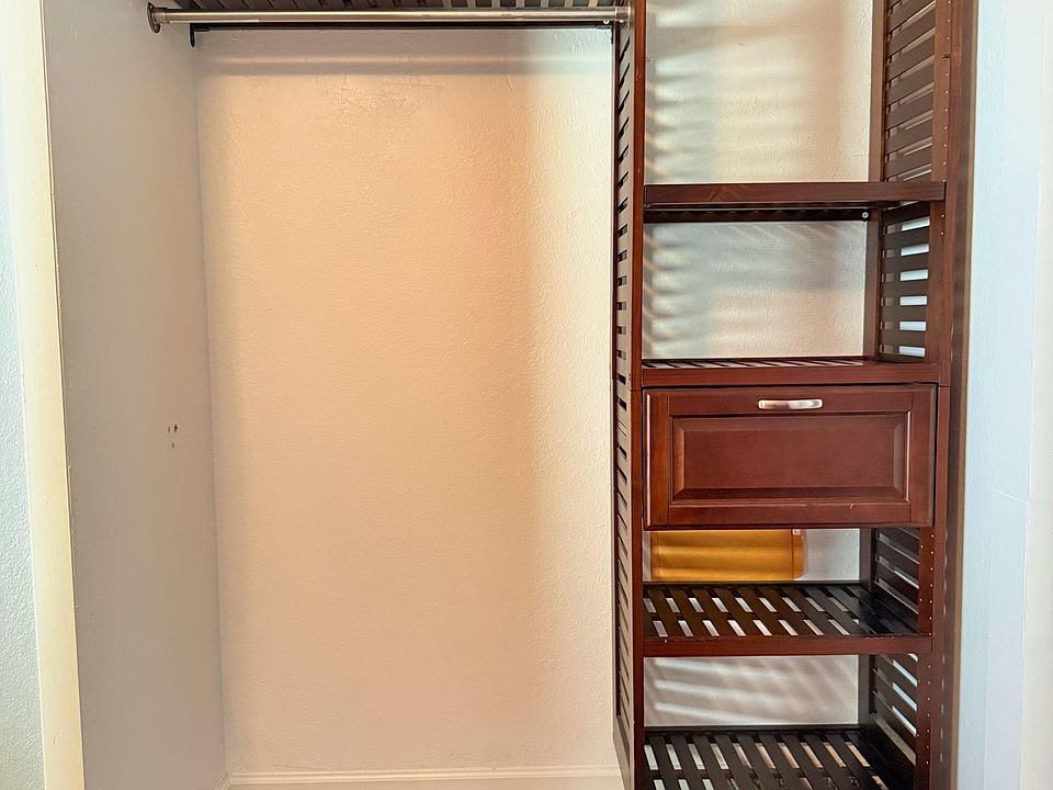Closet space with additional storage.