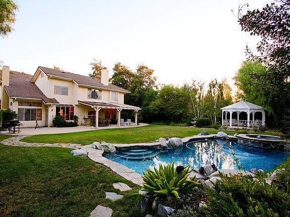 Beautiful property w/parklike grounds!