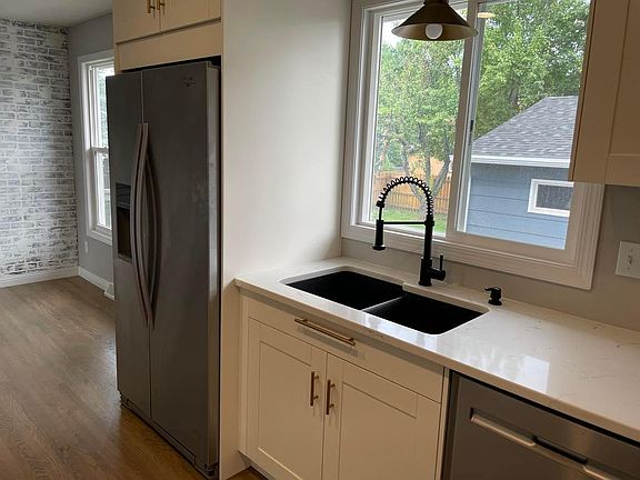 kitchen looking into backyard and garage