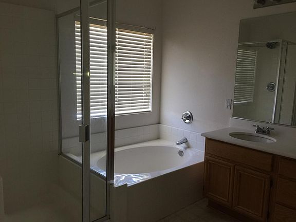 Master Bathroom with large tub and shower