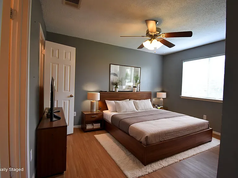 Virtually staged primary bedroom on the second floor.