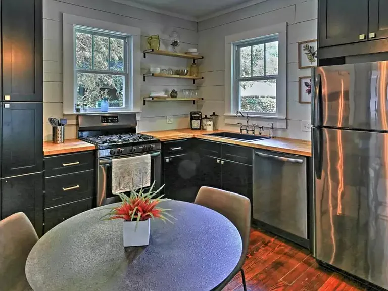Fully stocked kitchen with everything you need to prepare meals at home, including cookware, dishes, utensils, and locally roasted coffee to start your day.