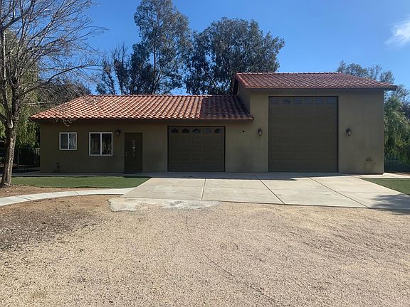 This is the second building on the property. It features the casita on the left, which is the unit for rent.