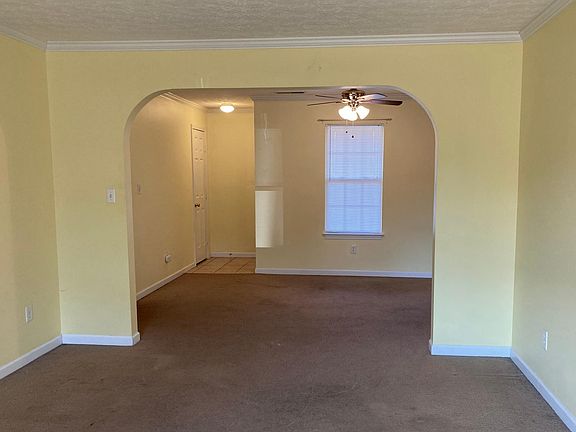FAMILY ROOM (LOOKING INTO DINING AREA)