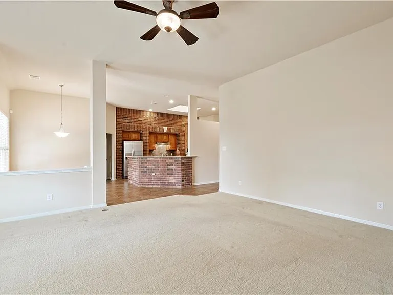 Large living room overlooking the kitchen and breakfast area