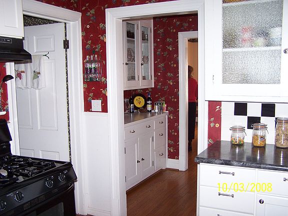 Looking from kitchen into dinette area w/built-ins