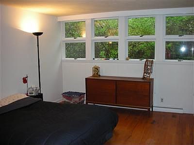Three ample sized bedrooms, all w/hardwood floors and windows galore!