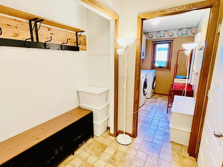 Mudroom (faces the garage door entry). The shoe cabinet could be left for the tenant upon request.