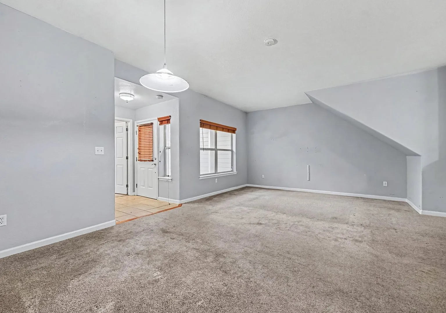 Spacious Ground-Level 2BR/2BA with 1-Car Garage & In-Unit Laundry — Photo 2