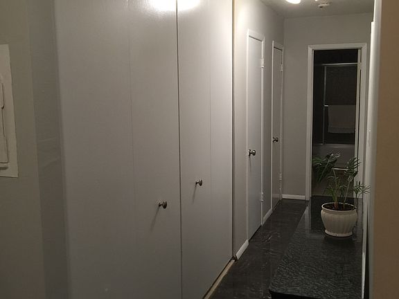 Hall way with wall to wall c