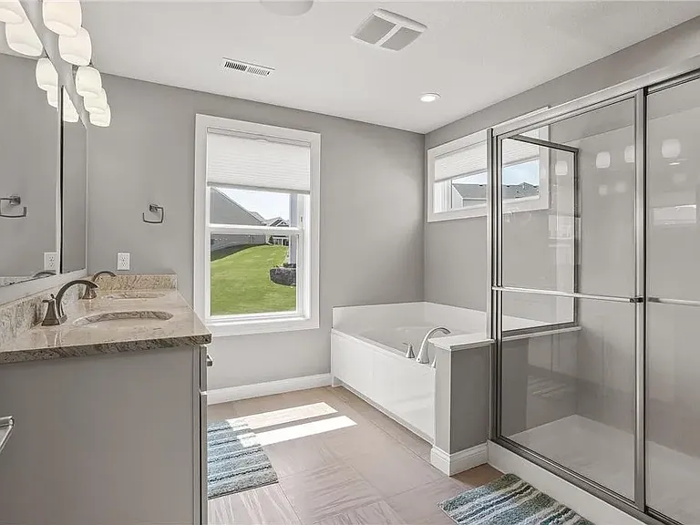 Primary bedroom with en suite bath