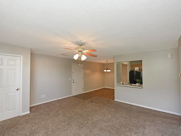 Explore comfort in this open-concept living area, perfect for relaxation and entertaining.