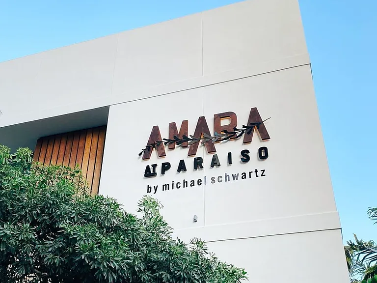 Waterfront dining experience at Amara at Paraiso / walking distance from the Building