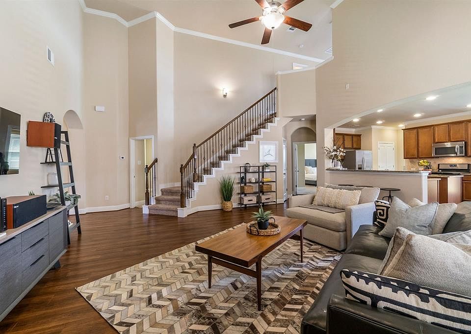 Welcome home to 3616 Cottage Pines Lane, a unique 1.5 story home!