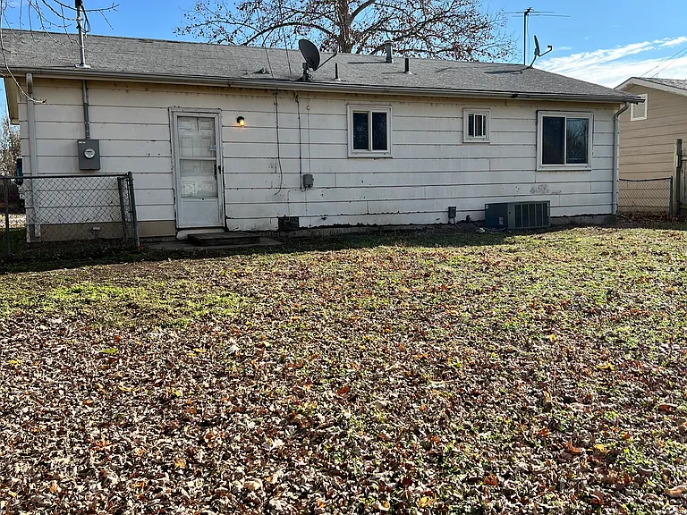 back of the house. fenced in big backyard