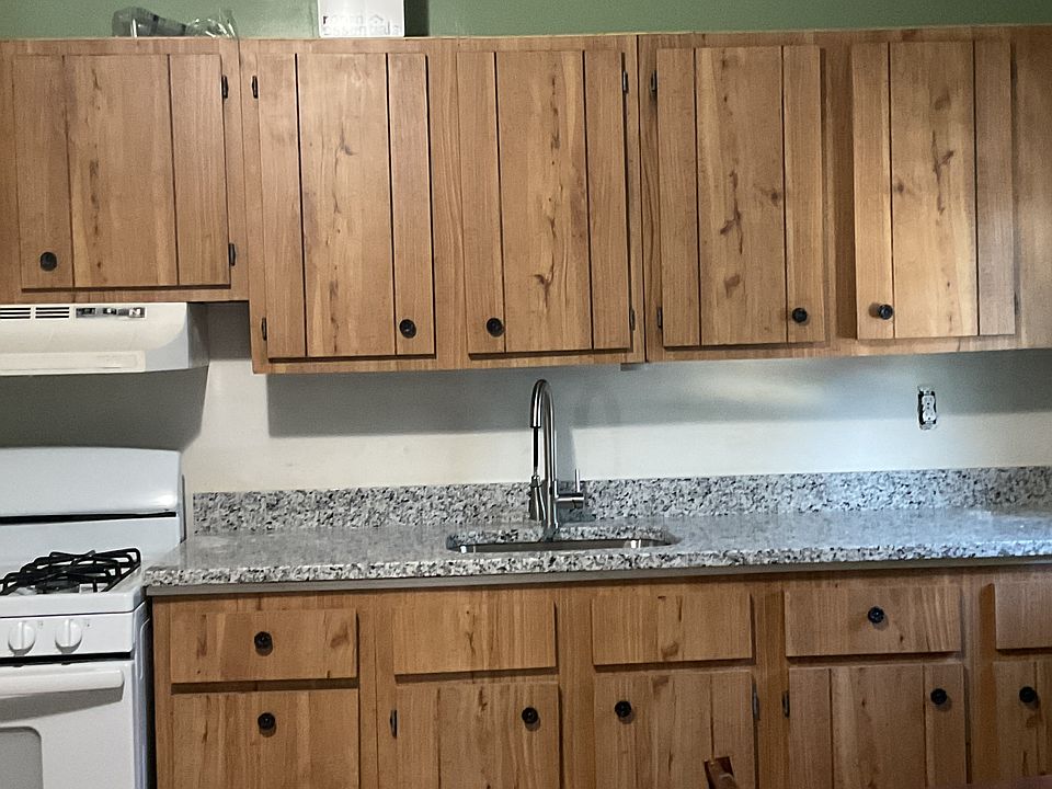 New granite countertop with Undermount sink and new touchless faucet