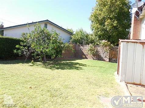 Good size side yard...block walls