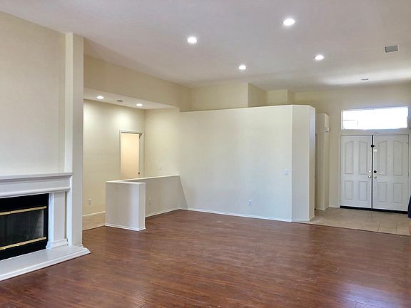 Complete remodeled, fresh paint. Enter the foyer into the spacious dining and living room. High ceilings with recessed lighting.