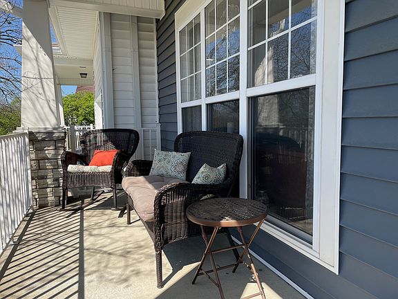 Cozy covered front porch for long summers, and additional seating and parking in the back of the house
