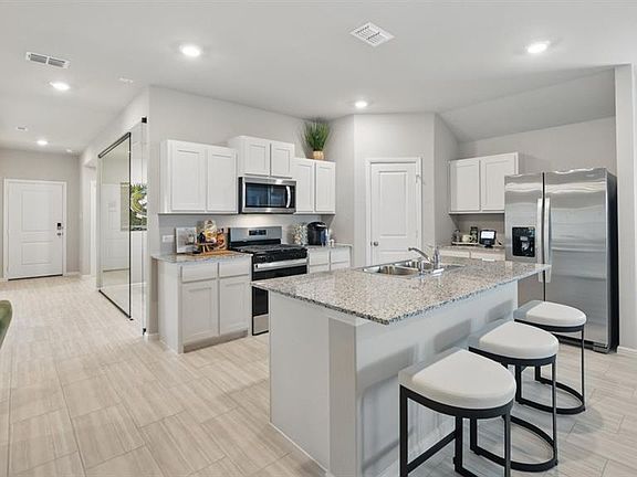 Kitchen- All Home and community information, including pricing, included features, terms, availability and amenities, are subject to change at any time without notice or obligation. All Drawings, pictures, photographs, video, square footages, floor plans, elevations, features, colors and sizes are approximate for illustration purposes only and will vary from the homes as built.