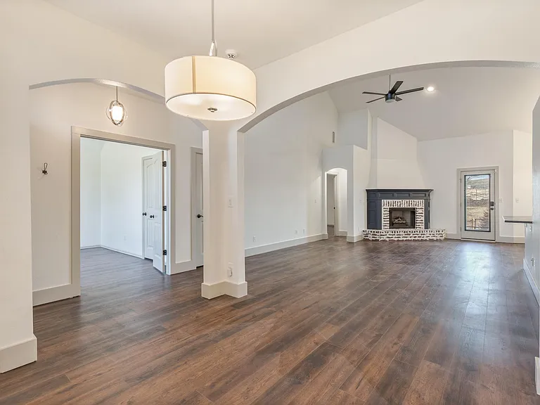 Dining Room and Living Room View With Fireplace