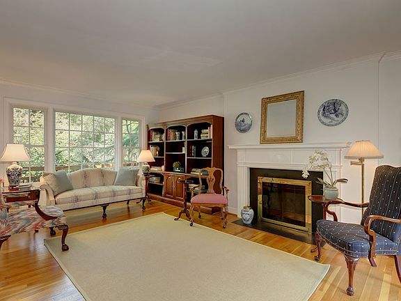 Elegant Living Room with wood burning fireplace
