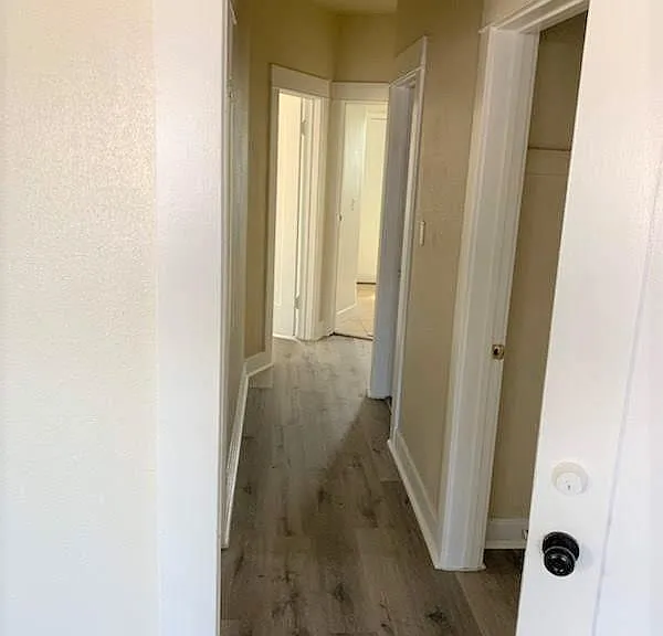Hallway to bathroom, bedroom, and laundry room