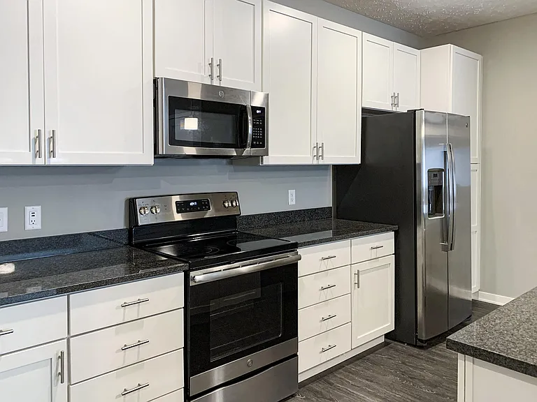 Our kitchens include sleek cabinetry and modern appliances, offering the perfect setup for your cooking needs.