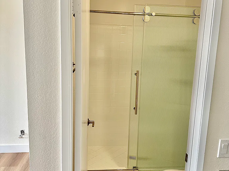 Unit #302 primary bathroom massive walk-in shower!